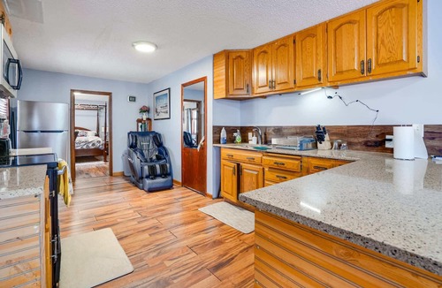 North Saint Paul Apartment | ‼️Chic Basement Getaway w/AC & Fire Pit