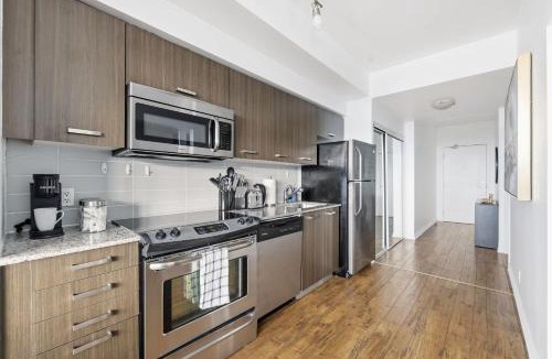 Bay Cloverhill Apartment | Chic Bay St Condo Skyline Views 55 TV