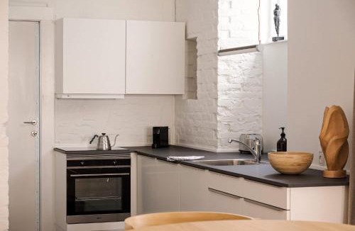 Indre By Apartment | Chic city pad with handpainted art in great location by Daniel&Jacob's