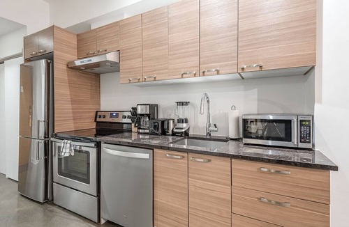 International District Apartment | Chic Old Montreal Apt with Terrace