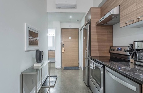 International District Apartment | Chic Old Montreal Apt with Terrace