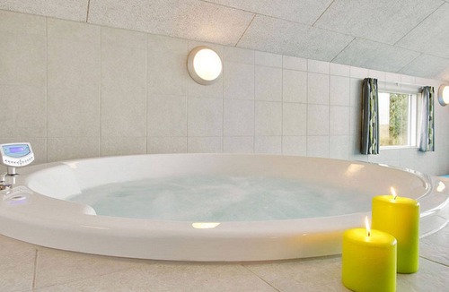 Skastrup Strand House | Chic pool and activity house with 5 bedrooms, 2 bathrooms, fireplace and WiFi