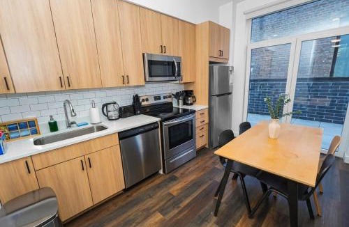 Near South Side Apartment | Chicago 4BR South Loop with Rooftop and Gym Near McCormick Place
