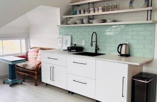 Pine Point Apartment | Chill on the rooftop at Pine Point Beach!