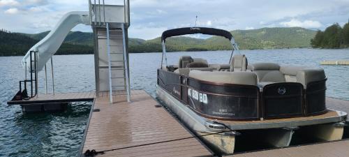 Kalispell House | Christys Cottage Waterfront with slide and Ice Shanty