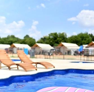 Sutherland Springs House | Cibolo Creek Haven: Family Glamping in a Waterfront Cabin Oasis