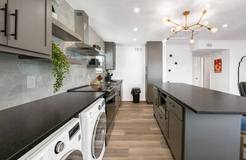 College Station Apartment | Cinema: 2 Bedroom, Walk to A&M, Comfy King Beds