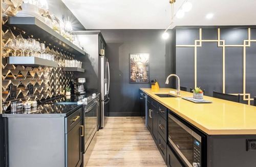 Cherokee Triangle Apartment | Cinema Suites @ Bungalou + Bourbon Bar + Gameyard