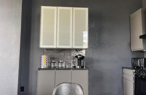 West Main Historic District Apartment | City Loft Escape with River Views! By Hollyhock