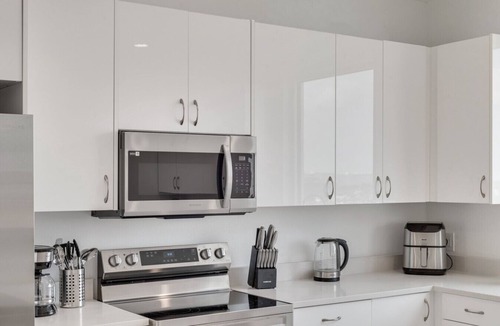 Cedars Apartment | City View 2BR I Parking I King Bed I Workspace