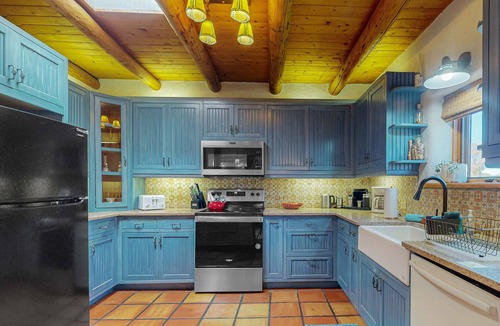 Taos House | Classic Adobe with hot tub, covered patio & pond near town