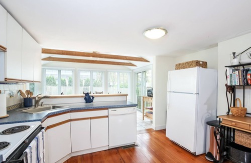 Teaticket House | Classic home with firepit & lovely yard, steps from Great Pond beach & path