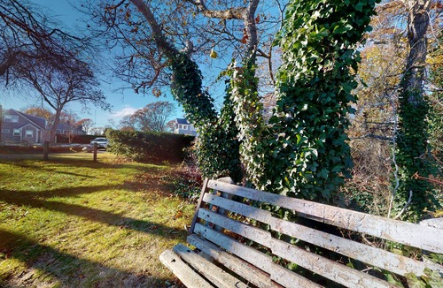 Teaticket House | Classic home with firepit & lovely yard, steps from Great Pond beach & path