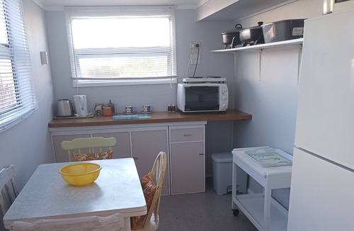 Karkari Peninsula Cottage | Classic Kiwi Bach.