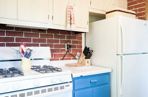 Grand Haven House | Classic Lake Cottage nestled in Wooded Dunes just
