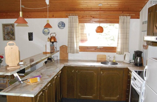 Gedesby House | Classic, practically furnished brick vacation home with inviting, fenced terraces and situated on be