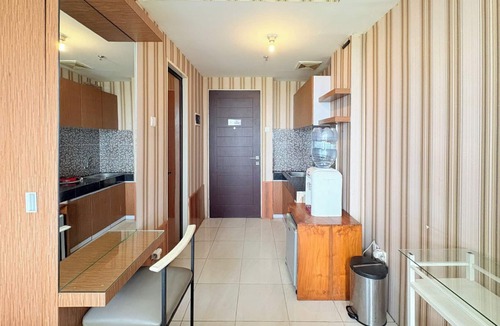 Depok Apartment | Classic Striped Touch Studio At Malioboro City Apartment