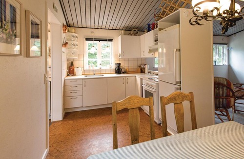 Hojby House | Classic vacation home with plenty of space in the garden to play.