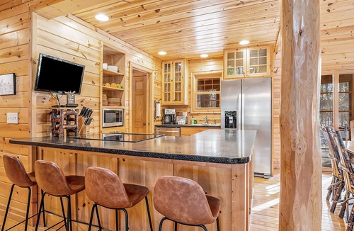 Saugatuck Cabin | Classic woodland cabin w/ private hot tub, fireplace, firepit, shared pool