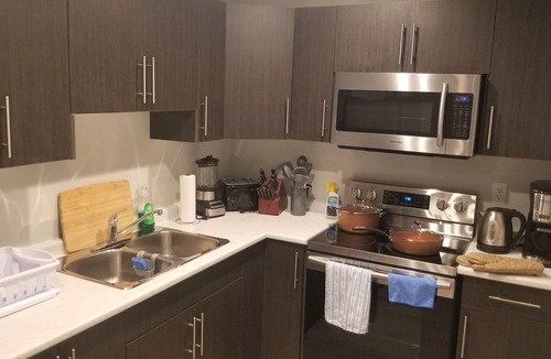 Saskatoon House | Clean, Cozy Pocket Friendly 2BR + A/C + Workspace + Ethernet & WiFi