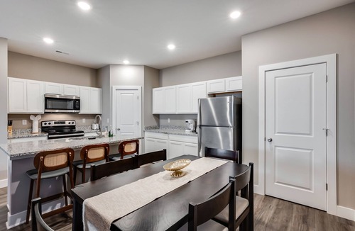 Bel Aire House | Close Drive to Wichita Hoops. Garage Parking + W&D