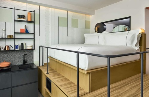 Cole Hotel | Close to Coors Field + Kitchen. Bar. Playroom.