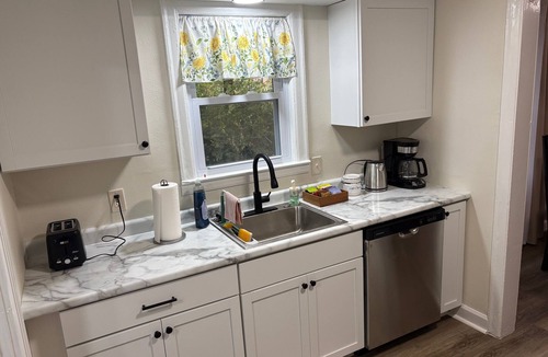 Lawrence House | Close to KU & Mass, ample off street parking, fire pit and backyard