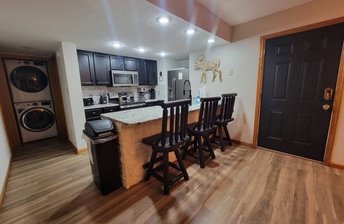 Pigeon Forge Ski Chalet | Close to Pigeon Forge- walking distance to outdoor pool-Outdoor kitchen and tv area and much more