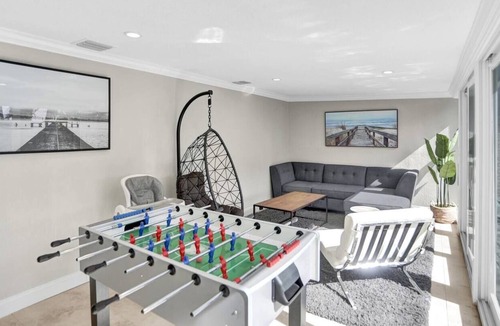 Coral Heights House | Close to the Beach! Heated pool, tiki bar, & BBQ
