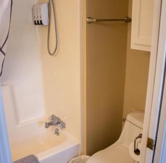 Fidelity House | Clyde's Cabin with a private Hot Tub