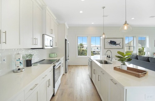 Gulf Shores Cottage | Coastal beach cottage steps away from the white sand beaches!