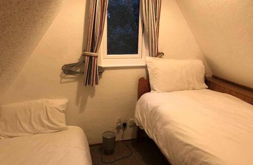 Martin Ski Chalet | Coastal Chalet - Sleeps 6 - Pool - Parking