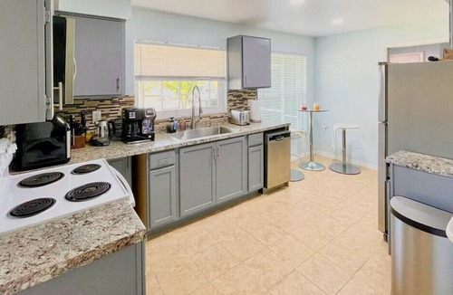 Eight Lakes House | Coastal Charm with Heated Pool