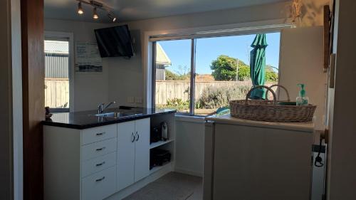 Waitarere Beach Apartment | Coastal Condo