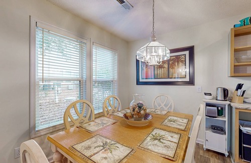 St. James Condo | Coastal Condo with golf course view and shared pool access