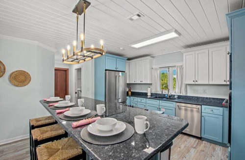 El Centro Beach House | Coastal Cutie ~ Pet-Friendly Beach Haven with Hot Tub & Fenced Backyard