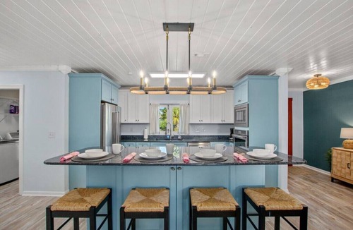 El Centro Beach House | Coastal Cutie ~ Pet-Friendly Beach Haven with Hot Tub & Fenced Backyard