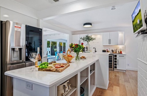 South Palm Park Neighborhood Association House | Coastal Oasis with Heated Pool