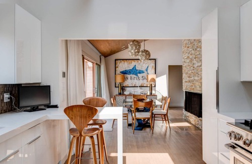 Beach Hampton House | Coastal-style home with private pool, open-floor plan, ample natural.