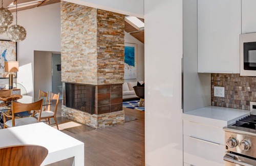 Beach Hampton House | Coastal-style home with private pool, open-floor plan, ample natural.