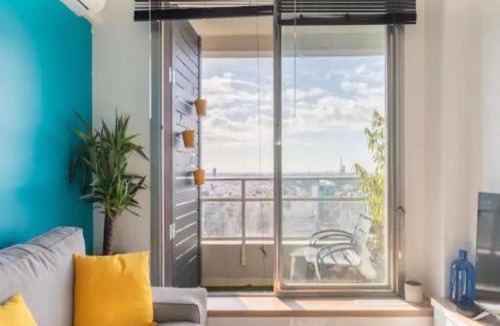 Puteaux Apartment | Cocon design et cosy à La Défense, vue imprenable sur Paris