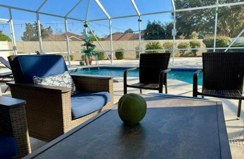 The Villages Villa | Coconut Courtyard, Tiki Hot Tub, Private Pool & Courtyard Retreat