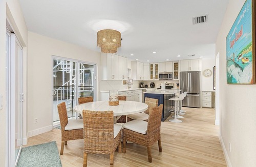 Pelican House | Coconut Cove Home with Sunny South-Facing Family Pool, Canal & Boat Dock
