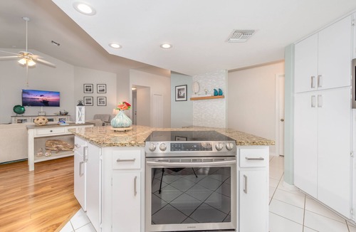 Pelican House | Coconut Cove/Scenic Waterfront Escape with Private Heated Pool & Spa