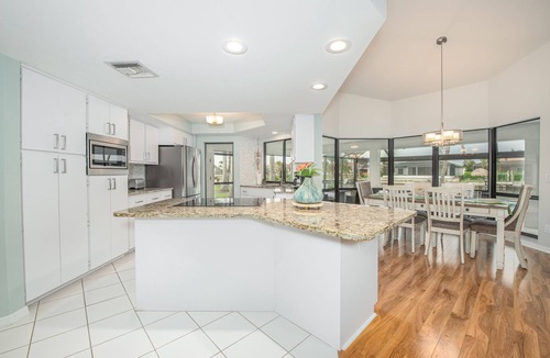 Pelican House | Coconut Cove/Scenic Waterfront Escape with Private Heated Pool & Spa