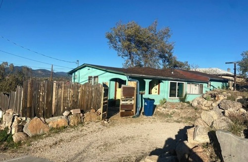 Tyrone House | Colorful & cozy adobe perched up in Chihuahua Hill with great views!
