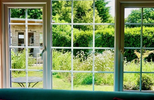 West Wittering House | Colourful Coastal Retreat. Six bedroom family home next to West Wittering beach.