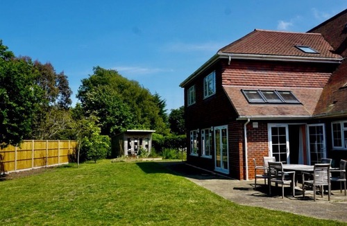 West Wittering House | Colourful Coastal Retreat. Six bedroom family home next to West Wittering beach.