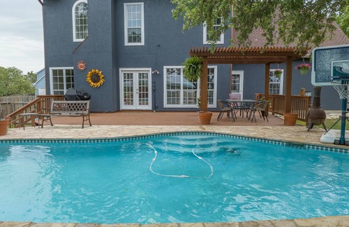 Castroville House | Come enjoy our peaceful house oasis that features a backyard patio with a pool!
