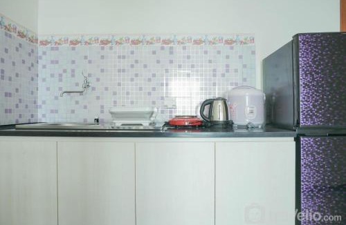 Pluit Apartment | Comfort and Elegant 1BR Green Bay Condominium Apartment By Travelio